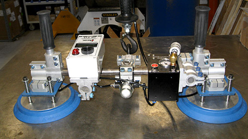 Moving metal Winnipeg Vacuum attachment crane jib lift