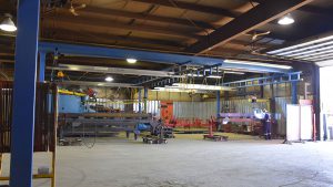 acculift crane system over welding work stations at ag manufacturing facilities