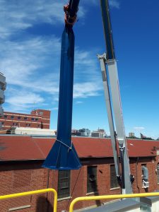 installing a jib crane outside articulating for lifting around obstructions