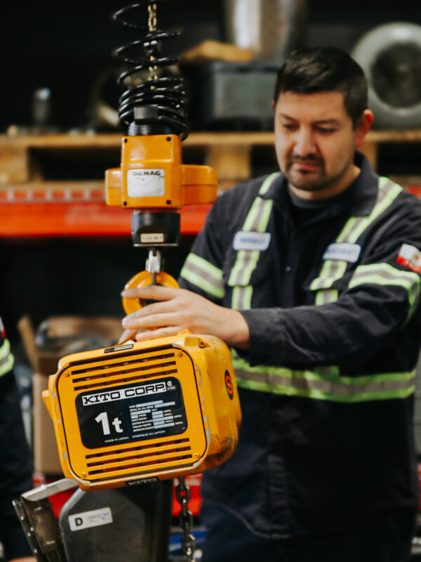 Service Technician Inspecting KITO Hoist