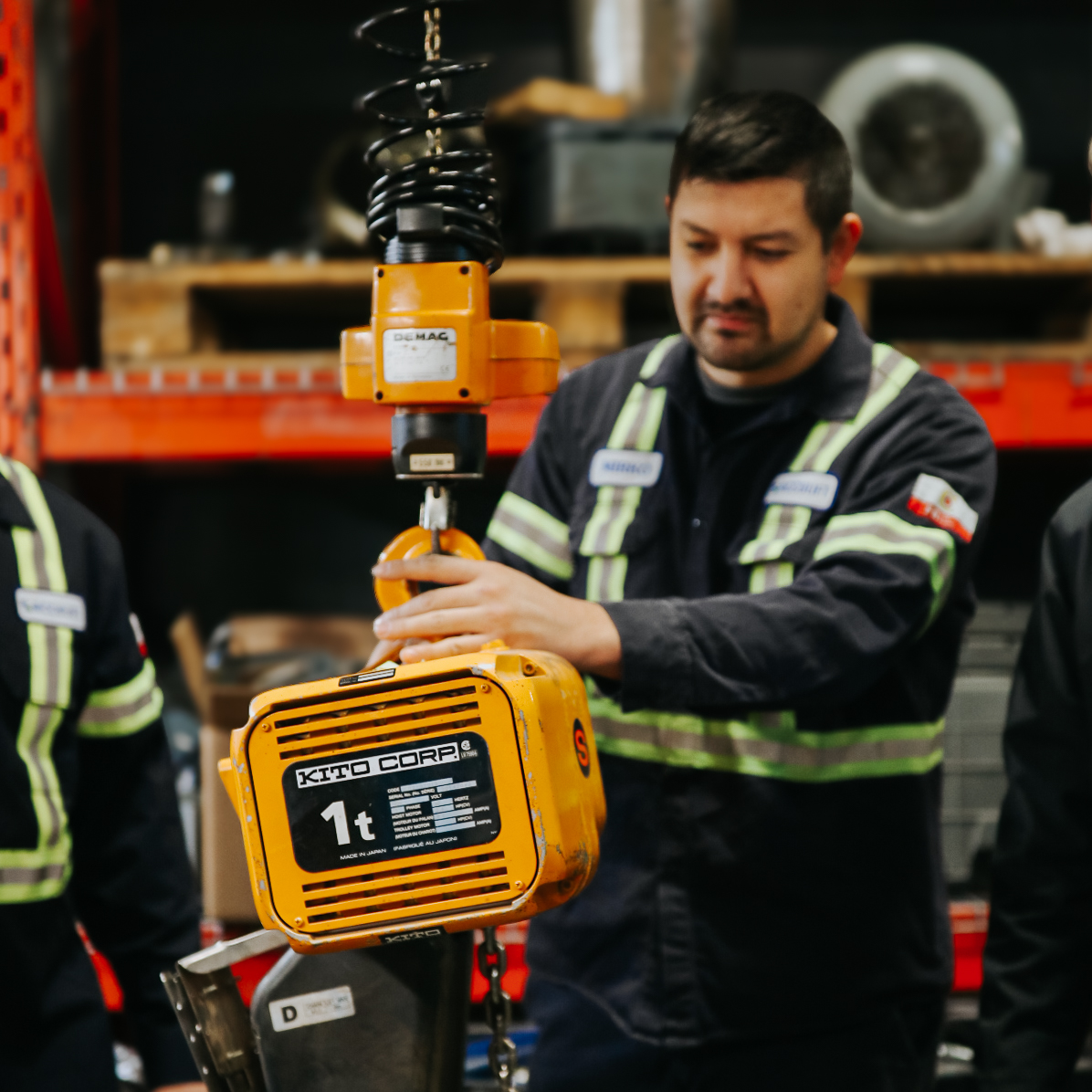 Service Technician Inspecting KITO Hoist