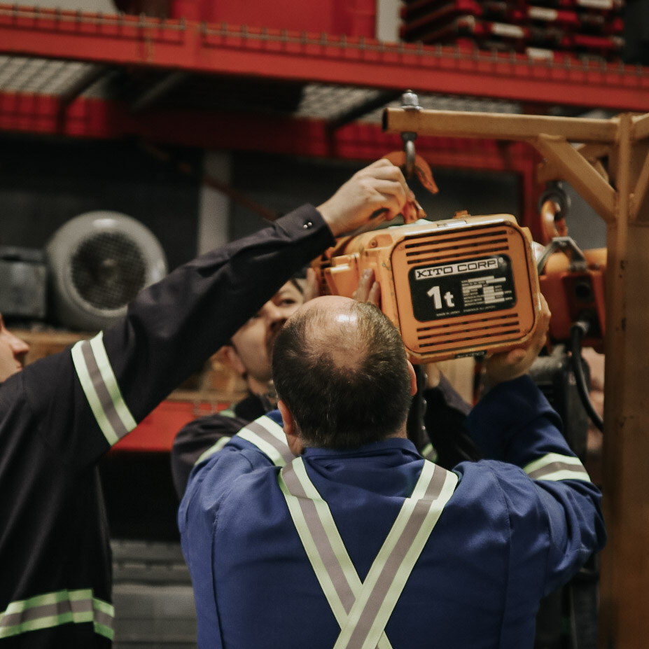 Techs Installing Hoist